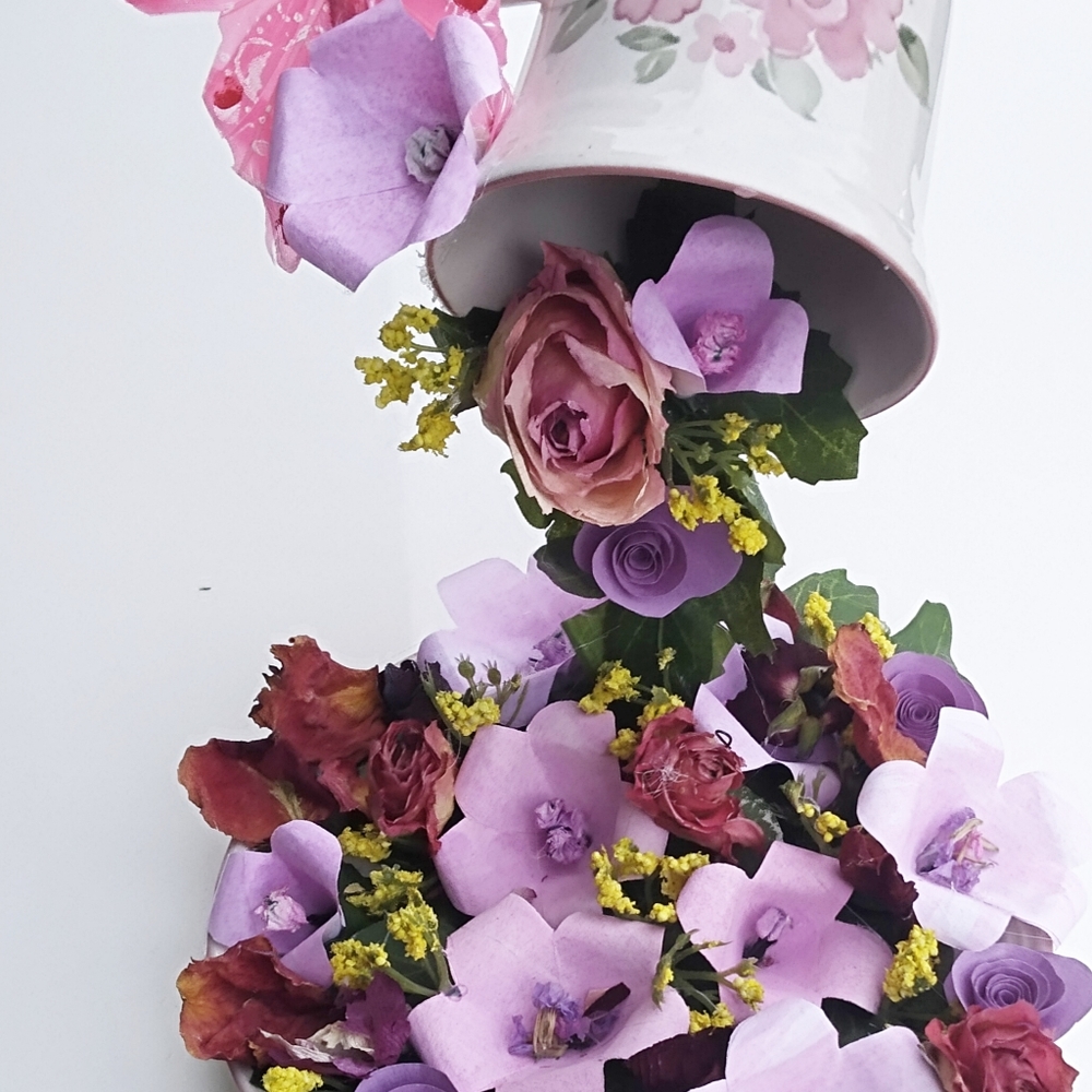Handmade artificial flowers  Tea cu and saucer